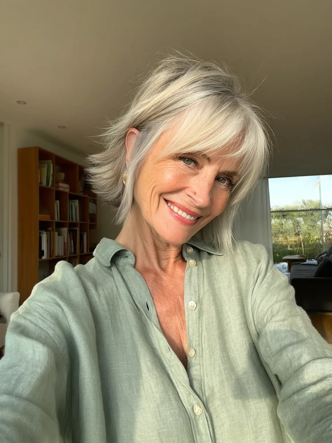 Silver Frost Feathered Chin-Length Layers with Wispy Bangs